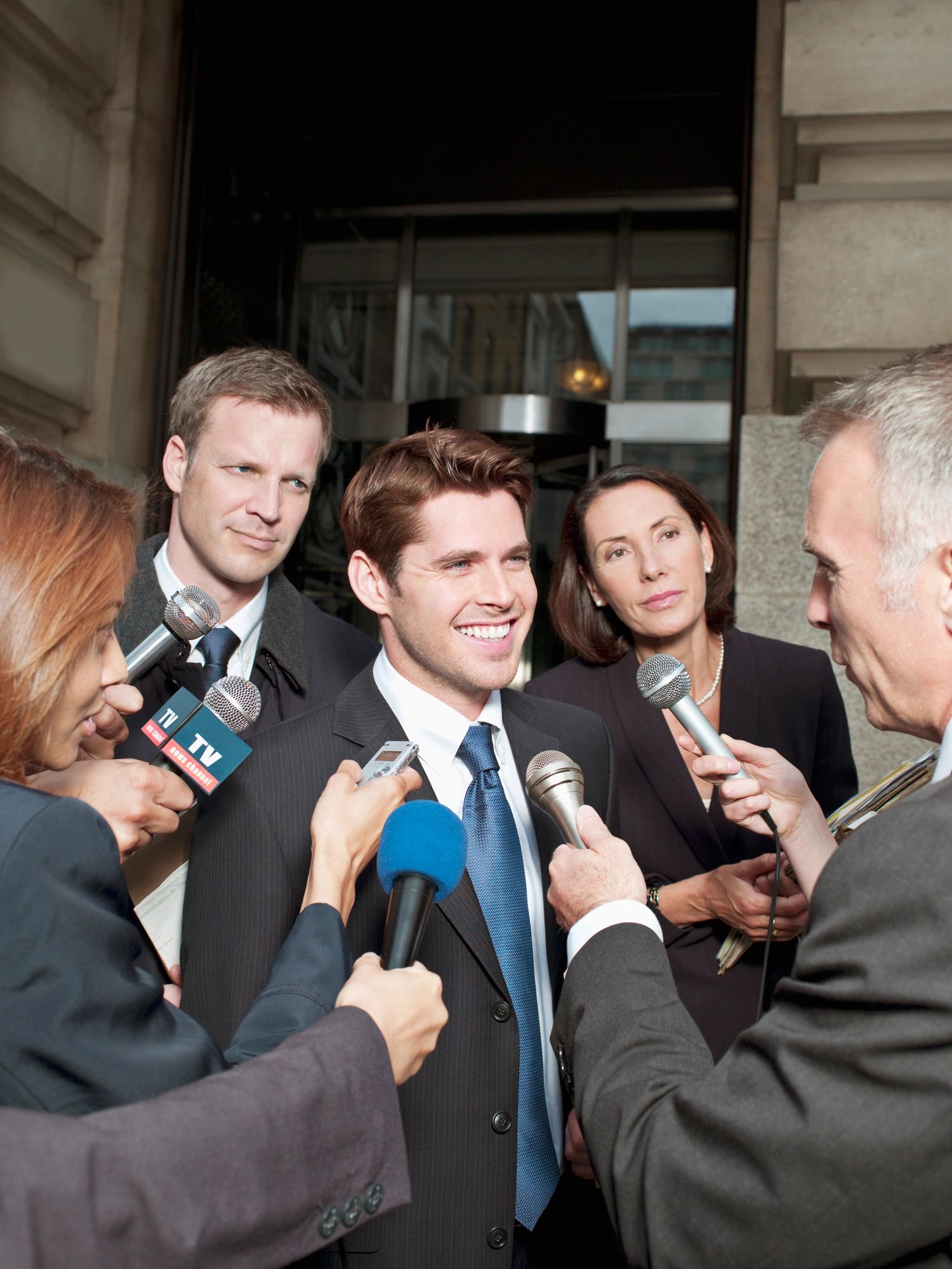 Reporter speaking during a media interview