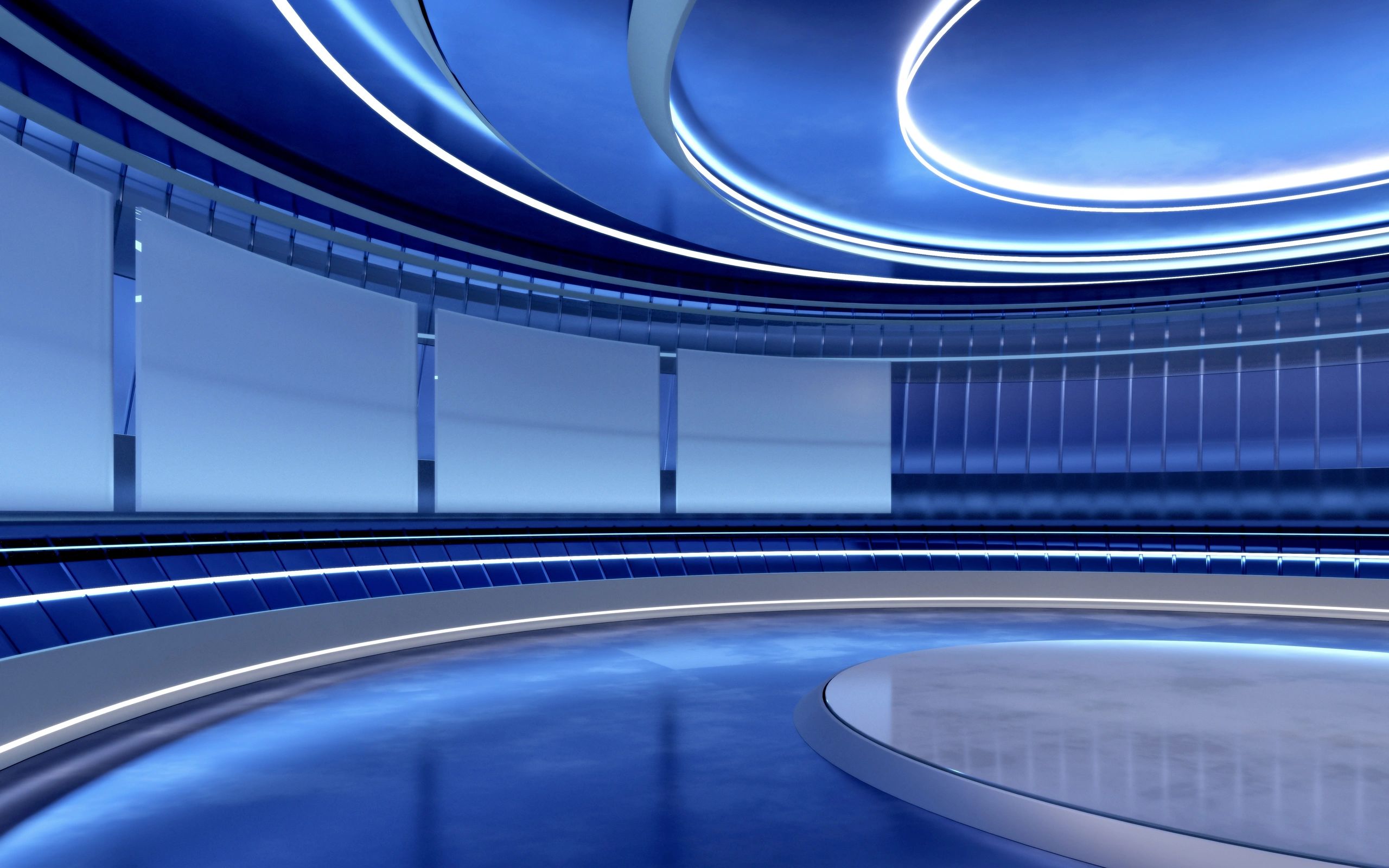 Modern blue television studio set with illuminated stage